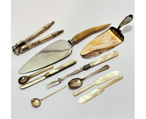 A Victorian Birmingham silver pearl handled engraved pickle fork, a Birmingham silver old English pattern mustard spoon, an E