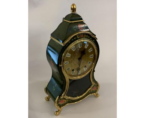 A reproduction mantel clock of cartouche form, twin train movement, H32cm