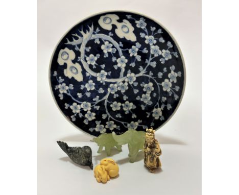 A Japanese circular plate decorated with cherry blossom design, seal mark verso (d 24cm), a resin made Netsuke style figure o