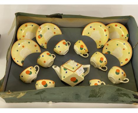 A Hancocks 'Ivory ware' Art Deco tea set, with hand painted polychromatic design, comprising a tea pot, six cups and saucers,