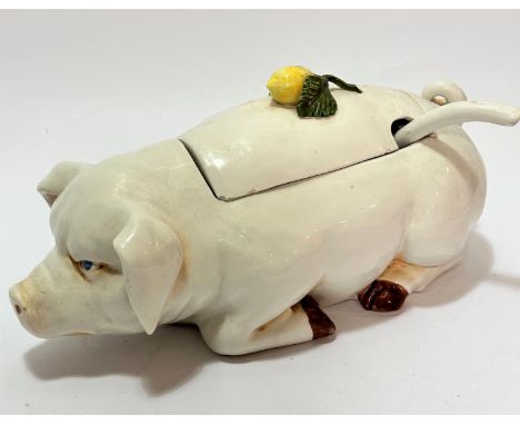 A Venetian novelty pig pottery tureen complete with sauce ladle and paper label inside of top, with lemon finial to top (20cm