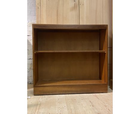 A mid 20th century teak open bookcase, fitted with one fixed shelf, (Alterations) H93cm, W100cm, D30cm
