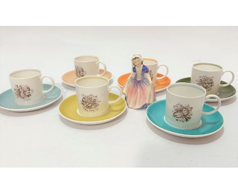A Susie Cooper 1950s twelve piece coffee set with stylised musical instrument transfer printed panels with coloured glazed sa