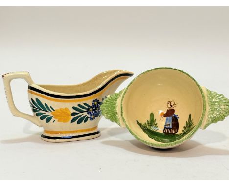 An Auld Heather Ware sauce boat with crackled glaze decorated with floral sprigs (mark to base) (l -7.5cm h- 2.7cm) , and a Q