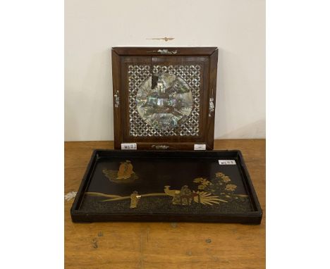 A Chinese hardwood and gilt laquered tray, having a simulated bamboo gallery and decorated with traditional figures on landsc