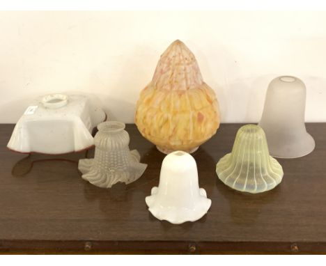 A collection of six early to mid 20th century glass light shades of various styles and designs