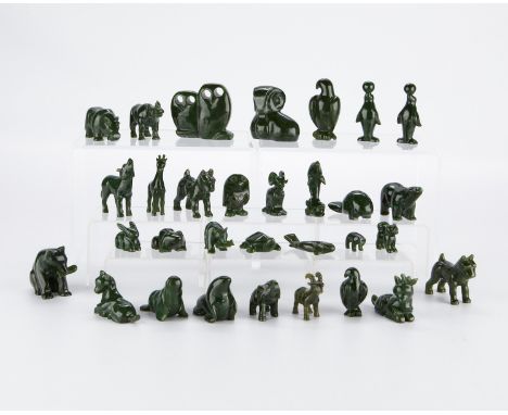 Group of 31 Alaskan Inuit jade carvings depicting a wide variety of animals, including bears, seals, eagles, and many more. A