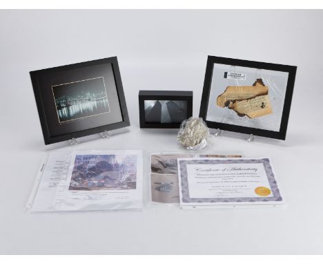 Group of objects related to the World Trade Center and 9/11 including a fragment of pulverized concrete recovered from Ground
