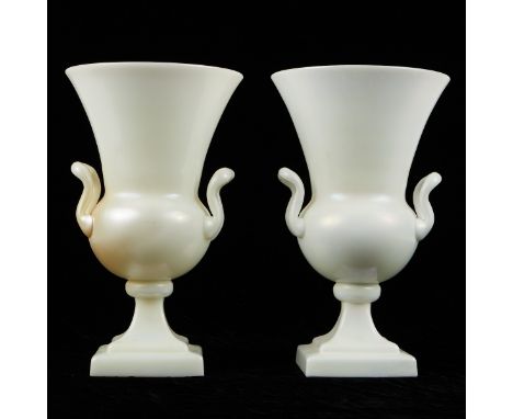 Frederick Carder (English, 1863-1963) for Steuben, United States. Pair of iridescent white "Ivrene" fluted glass vases. One h