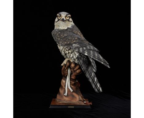 Giuseppe Armani (Italian, 1936-2006). Ceramic figure of a falcon perched on a falconer's glove titled "The Falconer." Hand si