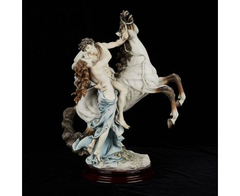 Giuseppe Armani (Italian, 1936-2006). Ceramic figure of a pair of lovers embracing, one mounted on a horse, titled "Embrace."
