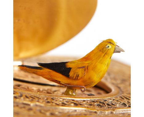 German Karl Griesbaum music box with a singing bird automaton. The sides and top of the brass box are elaborately decorated w
