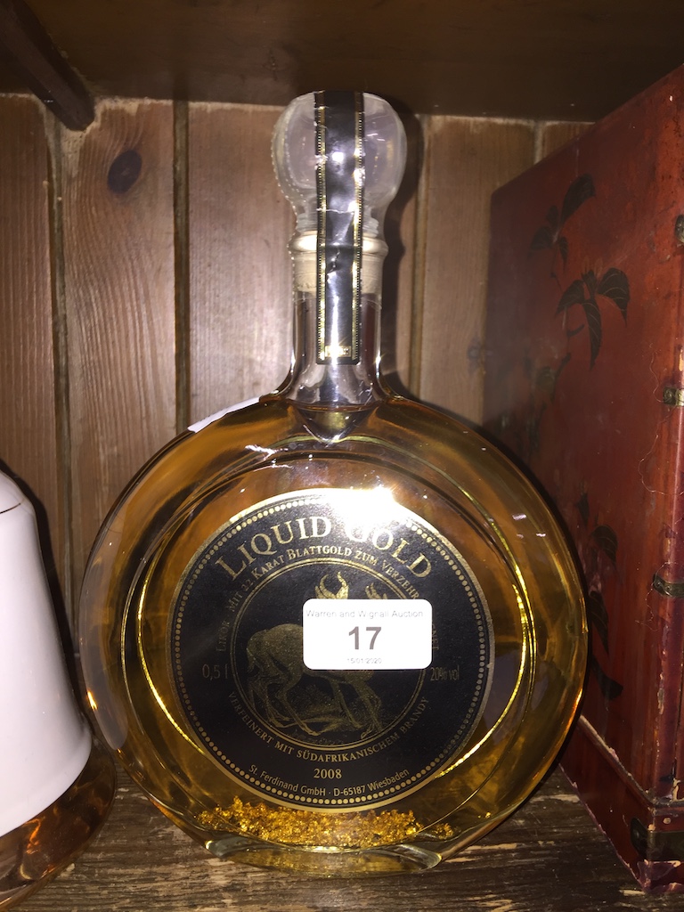 A 0.5L 2008 Liquid Gold brandy with 22 karat gold flakes, sealed and full.