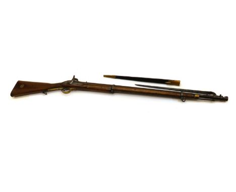 An Enfield two band percussion musket,19th century, with bayonet and scabbard, 32.5in barrel with steel ram-rod, the walnut s