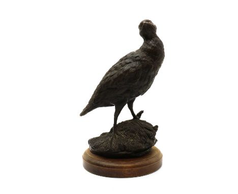 A bronze model of a partridge,20th cenutry, on naturalistic base, signed R. Donaldson 8433cm highCondition ReportPatination, 