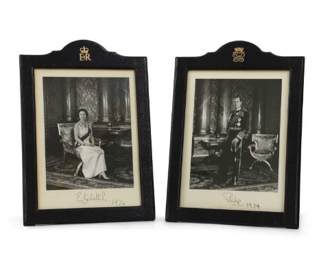 A pair of signed photographs of HM Queen Elizabeth and HRH Prince Philip, The Duke of Edinburghwith black and white portrait 