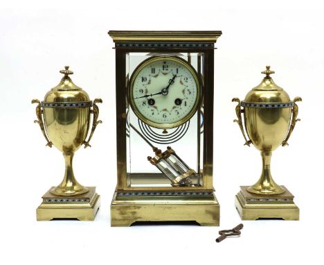 A French gilt metal mantel clock, late 19th early 20th century, the enamel dial with Arabic numerals and floral swags within 