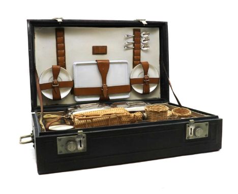 A Drew &amp; Sons En Route picnic set,early 20th century, the twin-handled leather case with an ivorine plaque inscribed 'Dre