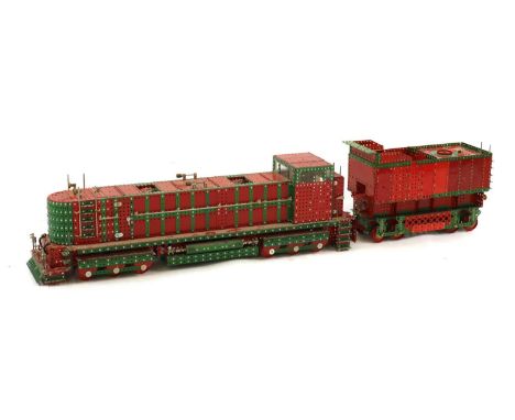 A large scratch-built Meccano steam locomotive,107cm longand tender,52cm longCondition ReportSome of the bolts are loose, com