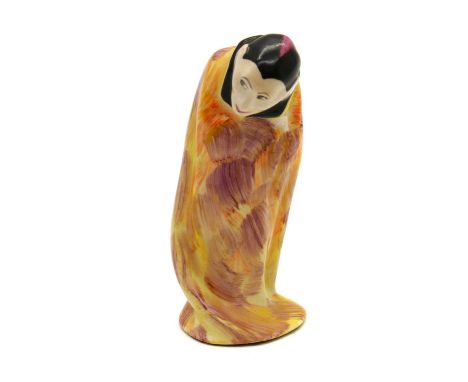 A Royal Doulton ceramic figure titled 'A Spook',designed by Harry Tittensor, c.1916-1936, painted with a black cap and a mott