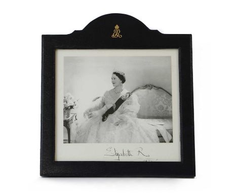 A signed photograph of HM Queen Elizabeth, the Queen Mother,a black and white portrait photograph by Cecil Beaton, signed to 