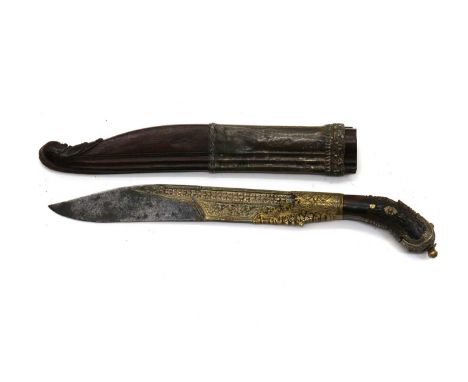 A Ceylonese Piha-Kaetta,18th century, the 22cm single edged recurved blade engraved with foliage overlaid with silvered coppe