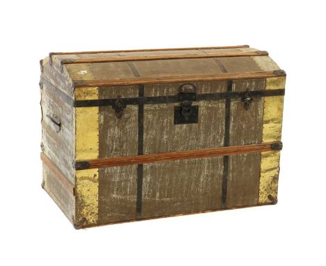 A metal-clad trunk,late 19th, Swedish, the domed top enclosing a papered interior, with ebonised carry handles,86cm wide53cm 
