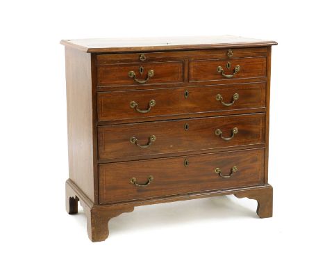 A George III style inlaid mahogany batchelor's chest,with brushing slide above two short and three long drawers on bracket fe