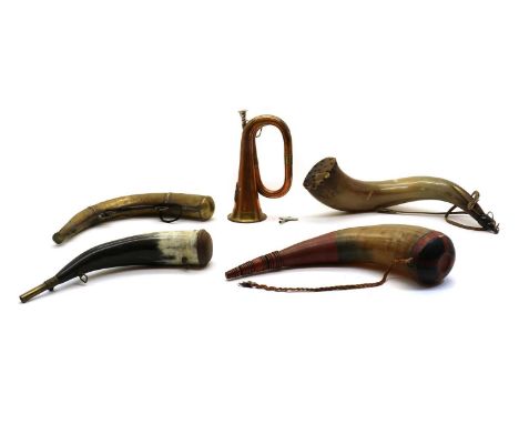 A collection of hunting horns,20th century, to include a North African brass example, three horn examples and a copper and br