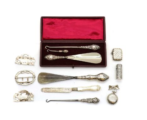 A collection of silver novelty items,comprising a sovereign case, by Dennison, Wigley &amp; Co, Birmingham 1905, floral embos