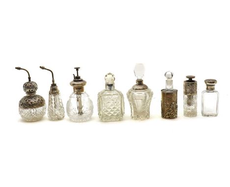 A collection of silver mounted cut glass atomisers,to include examples by J H Worrall, Son &amp; Co Ltd, London 1911, and a f