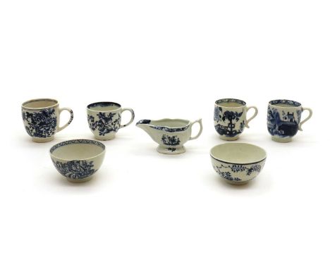 A collection of blue and white Lowestoft porcelain tea wares,mid to late 18th century, comprising a moulded sauce boat or cre