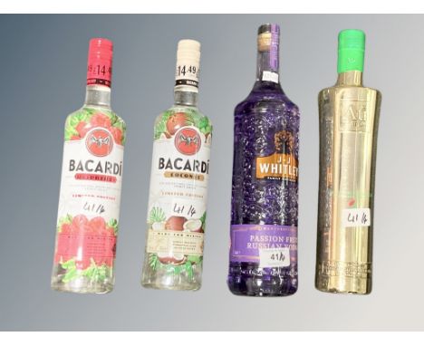 Four bottles : 1 x 1 litre J. J. Whitley Passion Fruit Vodka, 1 x 70 cl Au Vodka, 1 x 70 cl Bacardi Raspberry Rum & 1 X 70 cl