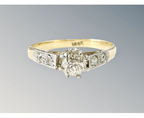 An 18ct gold diamond solitaire ring, the old-cut stone weighing approximately 0.25 carat, size K.  CONDITION REPORT: 1.8g