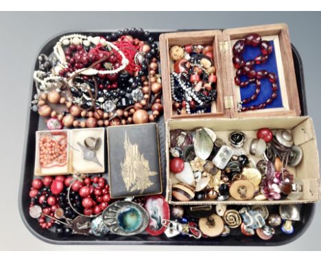 A collection of costume jewellery, brooches, necklaces, two coral necklaces, Japanese metal over lay trinket box 