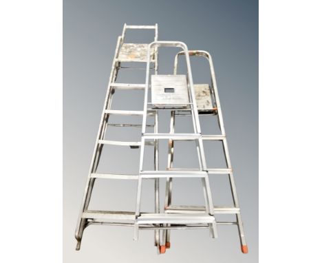 Three aluminium step ladders 