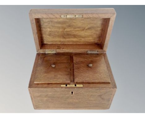 A 19th century oak tea caddy 
