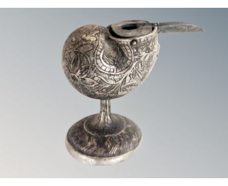 A silver plated and engraved inkwell in the form of a shell, height 8 cm 