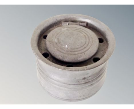 A 19th century pewter inkwell with ceramic liner 
