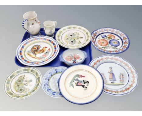Eleven pieces of French Quimper pottery 