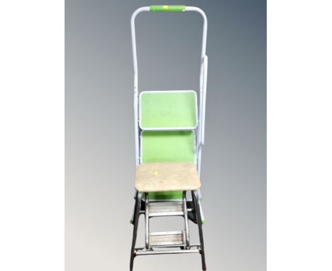 A folding Brantia step stool together with a further set of folding steps 