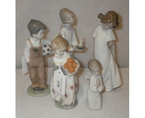 A COLLECTION OF LLADRO FIGURES including a small boy holding a football