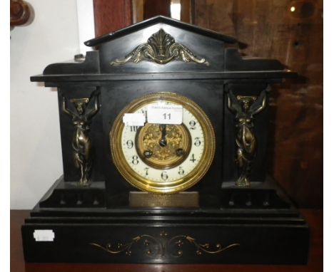 AN EARLY 20TH  CENTURY SLATE-CASED MANTEL CLOCK
