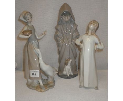 A LLADRO FIGURE OF A GIRL AND A GOOSE and two similar figures