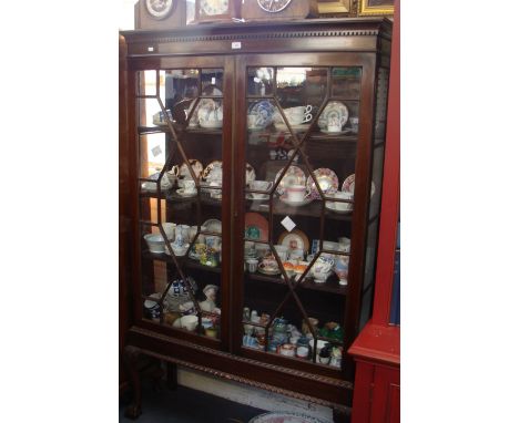 AN EDWARDIAN CHIPPENDALE REVIVAL DISPLAY CABINET on ball and claw feet, c. 44" wide x 73" high