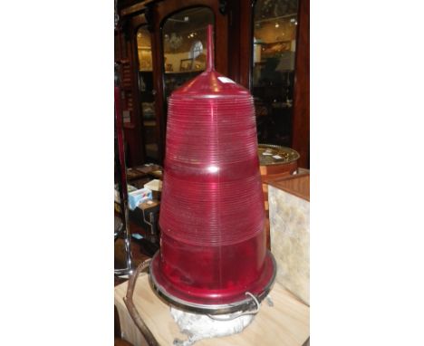 A LARGE RED SAFETY LAMP, originally from a crane on the breakwater on Portland Harbour, by Stone - Platt Industries