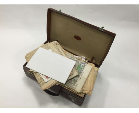 A COLLECTION OF SECOND WORLD WAR NEWSPAPERS, army books, drill books, maps and related ephemera in a leather case