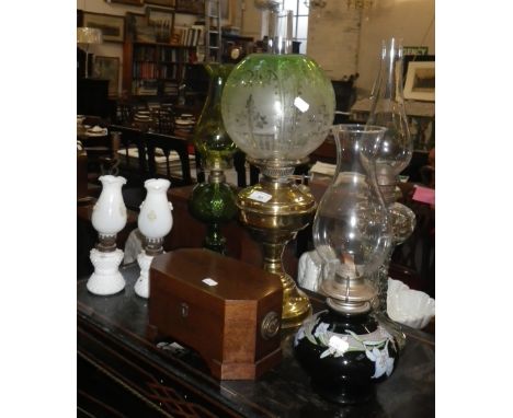 AN EDWARDIAN OIL LAMP with original green and frosted shade, a collection of similar oil lamps and a Continental jewellery bo