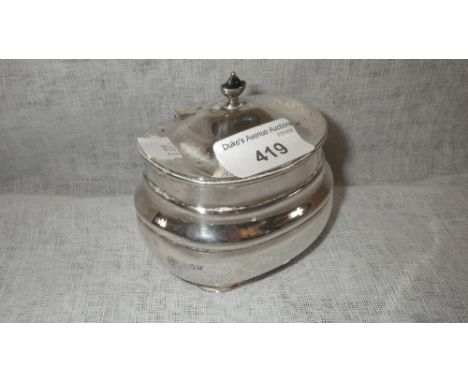 A SILVER CADDY with hinged lid