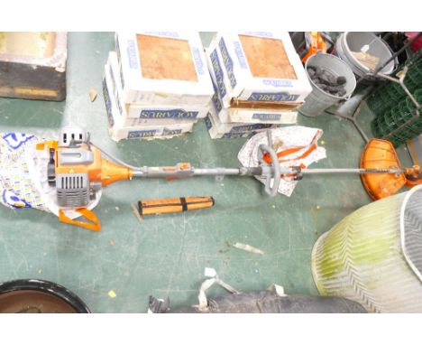 Petrol strimmer with accessories & Eskde five in one multi tool etc